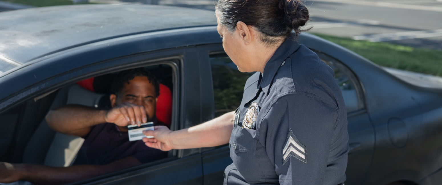 Officer stopping man driving - blog on Can You Appeal a Nevada DMV Decision After a DUI?
