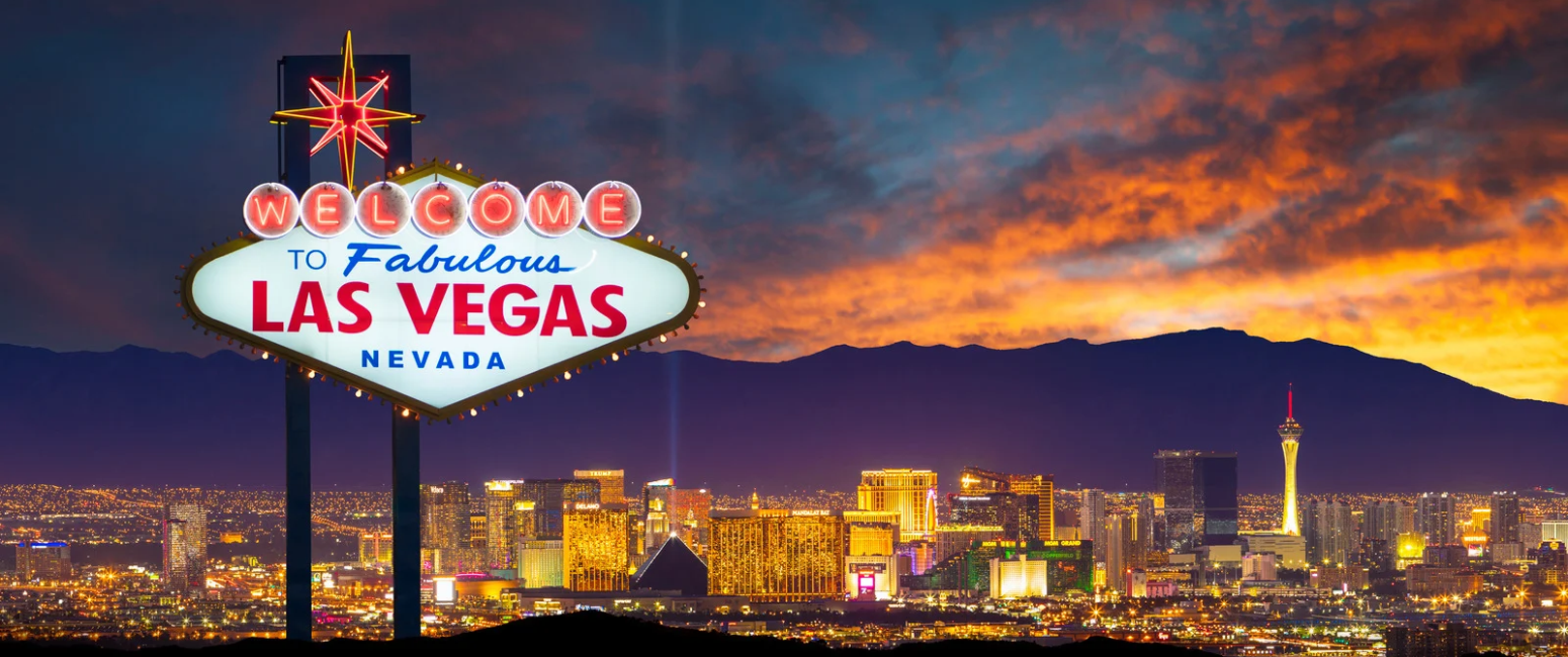 Las Vegas sign and skyline.