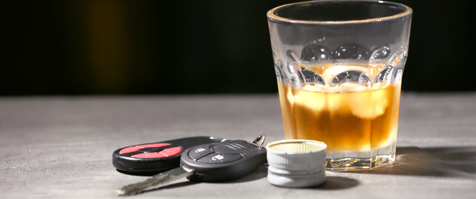 Alcohol drink and car keys - blog on DUI